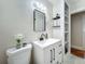 Stylishly updated bathroom featuring a modern vanity, fixtures, and a clean, bright design at 1642 Mount Vernon St, Orlando, FL 32803