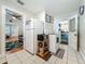 Spacious kitchen with white appliances, tiled floors, and an open layout provides practical functionality and easy access at 1642 Mount Vernon St, Orlando, FL 32803