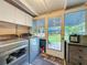 Laundry area with a washer and dryer set and a view of the backyard at 1642 Mount Vernon St, Orlando, FL 32803