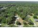 Aerial view of a home surrounded by lush greenery, highlighting its peaceful and private location at 18166 Lynbrook Rd, Orlando, FL 32820