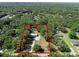 A tranquil home on a large lot surrounded by lush greenery and mature trees for ultimate privacy at 18166 Lynbrook Rd, Orlando, FL 32820