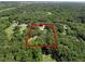 An idyllic home on a large, wooded lot providing a serene and private living experience at 18166 Lynbrook Rd, Orlando, FL 32820