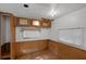 Bedroom with damaged ceilings, paneled walls, and window at 18166 Lynbrook Rd, Orlando, FL 32820
