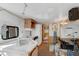 View of a kitchen and interior of a mobile home with an abundance of belongings at 18166 Lynbrook Rd, Orlando, FL 32820