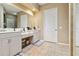 Bathroom featuring double vanity and tile flooring at 21795 Sw 88Th Lane Rd, Dunnellon, FL 34431