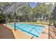 Relaxing pool with a large screened enclosure overlooking lush landscape at 21795 Sw 88Th Lane Rd, Dunnellon, FL 34431