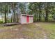 Storage shed surrounded by lush greenery at 21795 Sw 88Th Lane Rd, Dunnellon, FL 34431
