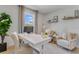 Stylish home office featuring modern decor, a functional desk, and cozy armchairs for a productive workspace at 2249 Lake Preserve Cir, New Smyrna Beach, FL 32168