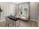 Versatile flex room with a cozy daybed, modern desk, and stylish decor at 2486 Celebration Blvd, Celebration, FL 34747