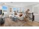 Spacious loft area featuring a comfortable sectional, lake views, and stylish decor at 2486 Celebration Blvd, Celebration, FL 34747