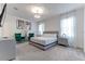 Bright main bedroom with ample natural light, contemporary decor, and a large bed at 2537 Shanti Dr, Kissimmee, FL 34746