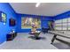 Entertainment room with a gaming theme, featuring a TV, a pool table and a basketball arcade game at 2537 Shanti Dr, Kissimmee, FL 34746