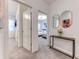 Bright hallway leading to bedrooms, showcasing tasteful decor and modern design at 2537 Shanti Dr, Kissimmee, FL 34746