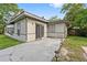 Enclosed backyard featuring a concrete patio and an adjacent grassy area at 2753 Beckwith St, Deltona, FL 32738