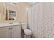Practical bathroom with shower, sink, and standard sized toilet at 2753 Beckwith St, Deltona, FL 32738
