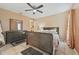 Cozy bedroom with neutral walls, ceiling fan and standard closet space at 2753 Beckwith St, Deltona, FL 32738