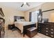 Well-lit bedroom featuring contemporary furniture, ceiling fan, and a closet at 2753 Beckwith St, Deltona, FL 32738