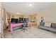 Bright living space showcasing an open layout, tile floors, and flexible use at 2753 Beckwith St, Deltona, FL 32738
