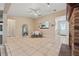 Spacious living room with tile flooring, fireplace, and a view to other rooms at 2753 Beckwith St, Deltona, FL 32738