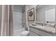Bathroom showcasing a granite vanity top, shower with a curtain, and modern fixtures at 3304 Wye Oak Dr, Apopka, FL 32703