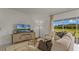 Comfortable living room with large windows offering natural light and outdoor views at 3304 Wye Oak Dr, Apopka, FL 32703