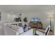 Open concept living space featuring a kitchen and living room with stylish decor at 3304 Wye Oak Dr, Apopka, FL 32703