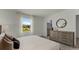 Bright main bedroom features a view of trees and has an attached bathroom at 3304 Wye Oak Dr, Apopka, FL 32703