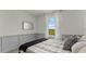 Inviting bedroom with a window offering scenic views and stylish accents for a peaceful retreat at 3310 Wye Oak Dr, Apopka, FL 32703