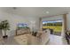 Cozy living room with a large sliding glass door overlooking the backyard at 3310 Wye Oak Dr, Apopka, FL 32703