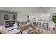 Inviting living room seamlessly connects to the dining area and kitchen at 3310 Wye Oak Dr, Apopka, FL 32703
