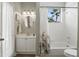 Bathroom featuring single sink vanity, decorative shower curtain and combination tub and shower at 387 Devon Pl, Lake Mary, FL 32746