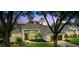 Beautiful single-Gathering home with a tile roof, well-manicured landscaping, and an attached two car garage at 387 Devon Pl, Lake Mary, FL 32746