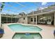 Enclosed pool with spa, patio, and plenty of room for outdoor living at 387 Devon Pl, Lake Mary, FL 32746