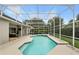 Inviting screened pool and patio area for outdoor relaxation and entertainment at 387 Devon Pl, Lake Mary, FL 32746