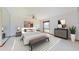 Bright bedroom featuring a neutral color scheme, ceiling fan, and plenty of natural light at 42 W Grenewood Ln, Haines City, FL 33844