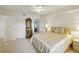 Bright bedroom with neutral carpet and a view to the closet at 426 Bouchelle Dr # 202, New Smyrna Beach, FL 32169