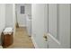 Bright laundry area with modern washer and dryer, convenient storage basket, and ample lighting at 426 Bouchelle Dr # 202, New Smyrna Beach, FL 32169