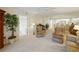 Spacious living area with plenty of natural light and an open layout leading to other rooms at 426 Bouchelle Dr # 202, New Smyrna Beach, FL 32169
