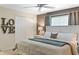 Inviting bedroom with a cozy bed, soft lighting, and elegant decor creating a relaxing retreat at 4895 Clock Tower Dr, Kissimmee, FL 34746
