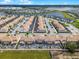 Aerial view of the community, highlighting houses with private pools at 5025 Windermere Ave, Kissimmee, FL 34746