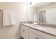 Bathroom featuring double vanity with quartz countertop and ample storage at 5025 Windermere Ave, Kissimmee, FL 34746
