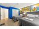 Charming bedroom with two twin beds, playful Minions decor, and a closet at 5025 Windermere Ave, Kissimmee, FL 34746