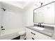 Newly renovated bathroom features modern fixtures, sleek vanity, and subway tile shower at 5160 Conroy Rd # 21, Orlando, FL 32811
