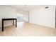 Expansive living room showcasing bright, airy ambiance, enhanced by modern lighting and sleek flooring at 5160 Conroy Rd # 21, Orlando, FL 32811