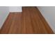 Bedroom featuring beautiful hardwood floors, base trim, and neutral walls at 5220 Via Hacienda # 212, Orlando, FL 32839