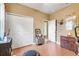 Bedroom features updated floors, baseboards and a closet with plenty of storage at 5263 Beach River Road, Windermere, FL 34786