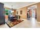 Dining room with a large table and chairs and a window with natural light at 5263 Beach River Road, Windermere, FL 34786