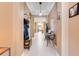 Hallway featuring tile flooring and neutral colored walls at 5263 Beach River Road, Windermere, FL 34786