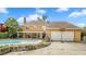 Backyard with an in-ground swimming pool and a two-car garage at 5891 Sir Henry Rd, Orlando, FL 32808