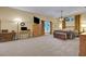 Spacious main bedroom with plush carpeting, ample natural light, and elegant furnishings at 6092 Sabal Hammock Cir, Port Orange, FL 32128